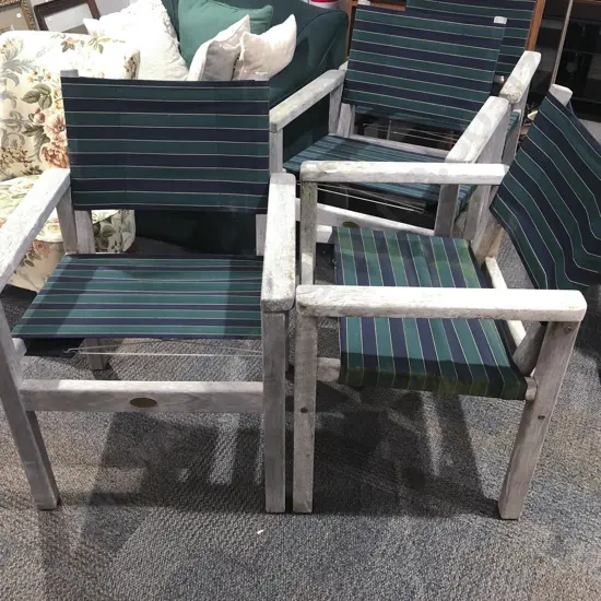 Set of Four Deck Chairs together with Coffee Table