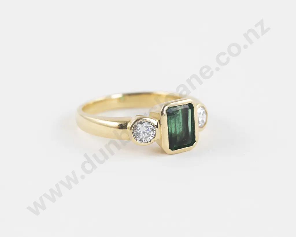 18ct Three Stone Synthetic Emerald and Diamond Bridge Ring Image 1++
