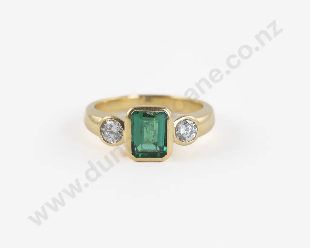 18ct Three Stone Synthetic Emerald and Diamond Bridge Ring Image 1++