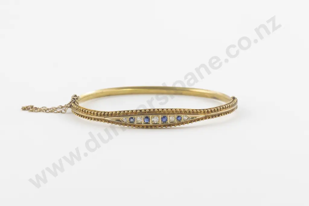 Late Victorian 15ct Nine Stone Diamond and Sapphire Hinged Snap Bangle Image 1++