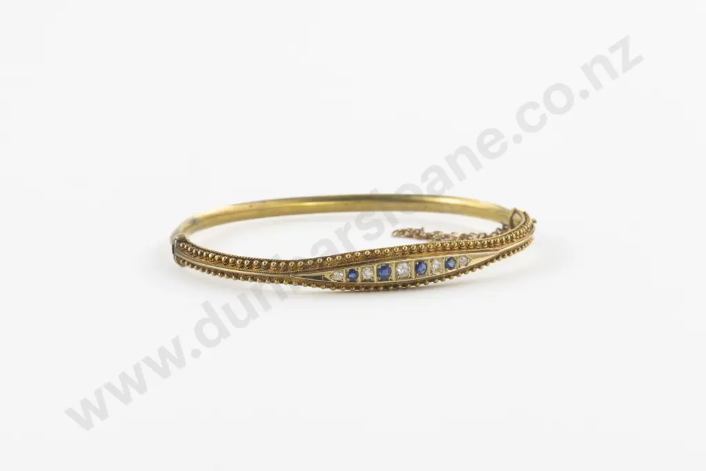 Late Victorian 15ct Nine Stone Diamond and Sapphire Hinged Snap Bangle Image 1++