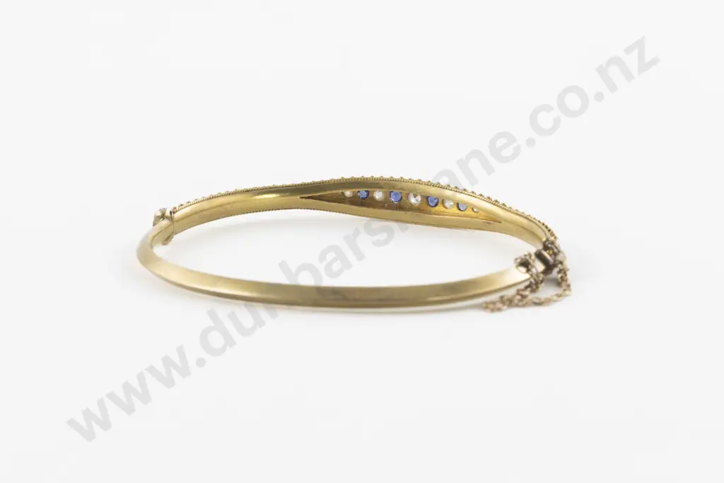 Late Victorian 15ct Nine Stone Diamond and Sapphire Hinged Snap Bangle Image 1++