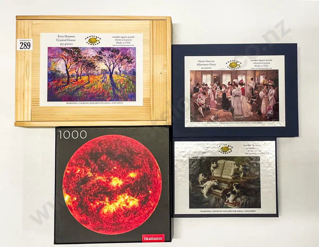 Four Made in USA Artifact Puzzles Image 1++