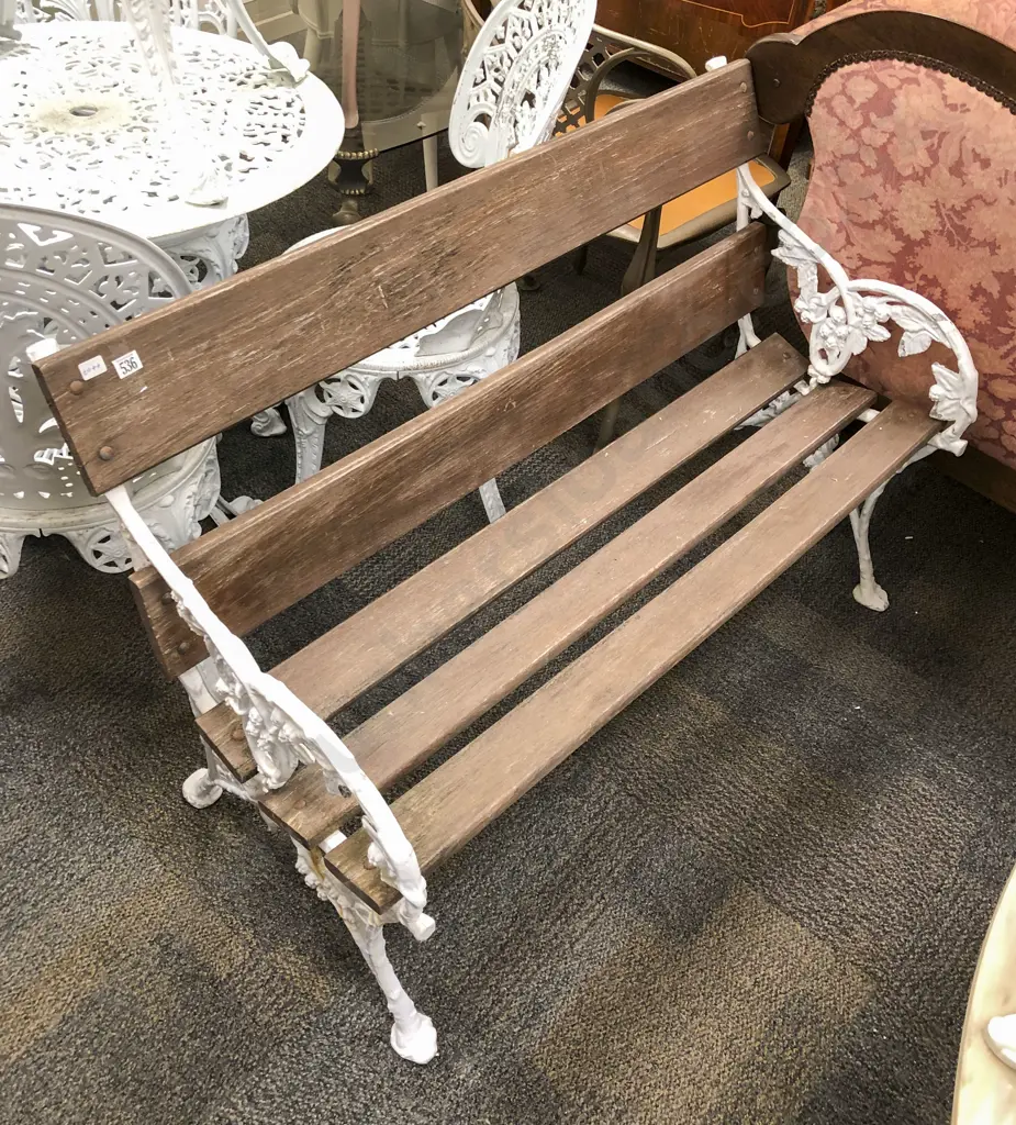 Two Seater Slatted Wooden and Cast Metal Bench Image 1++