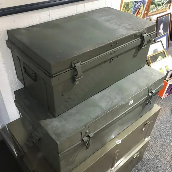 Two Green Painted Metal Trunks