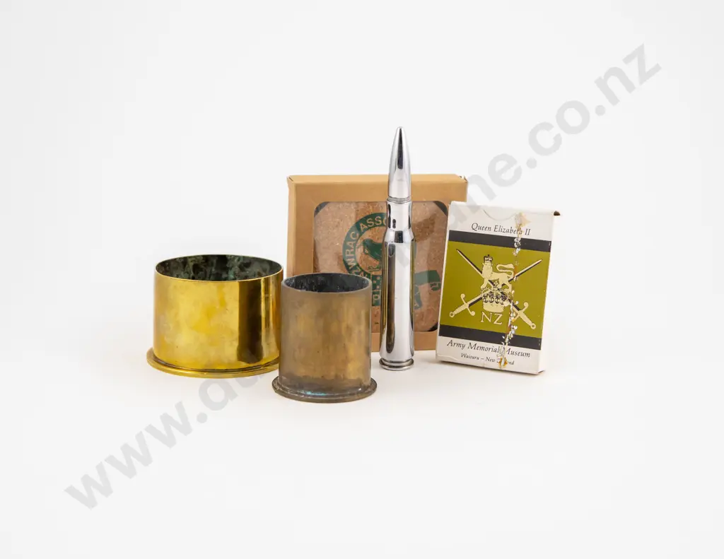 Two Brass Shell Casings Image 1++