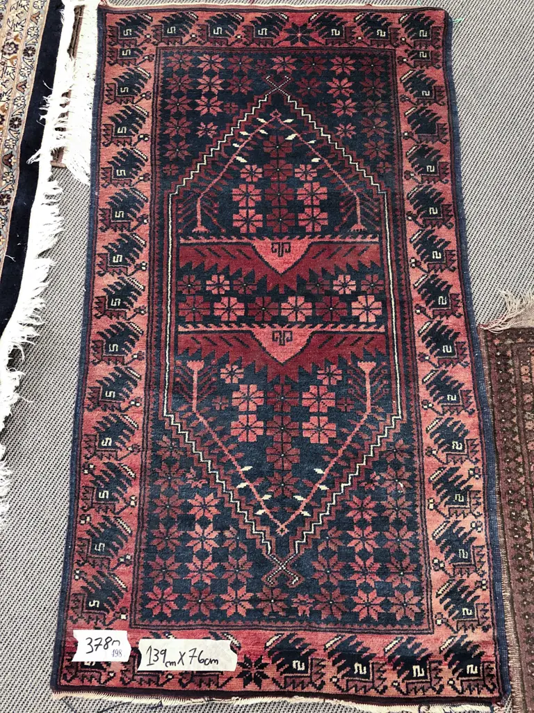 Small Persian Rug with Large Central Lozenge Shaped Medallion in Red and Dark Blue Tones Image 1++