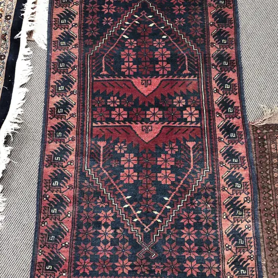 Small Persian Rug with Large Central Lozenge Shaped Medallion in Red and Dark Blue Tones
