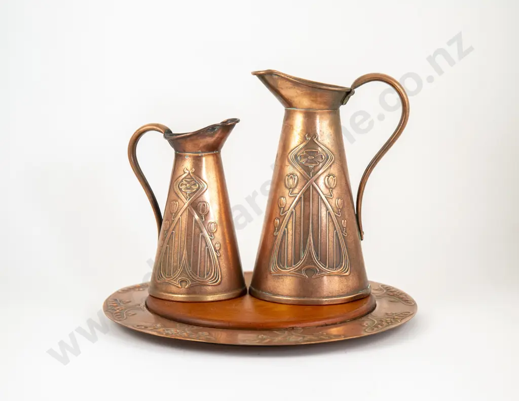 Pair Of Graduated Art Nouveau Copper Jugs By Joseph Sankey & Sons Image 1++
