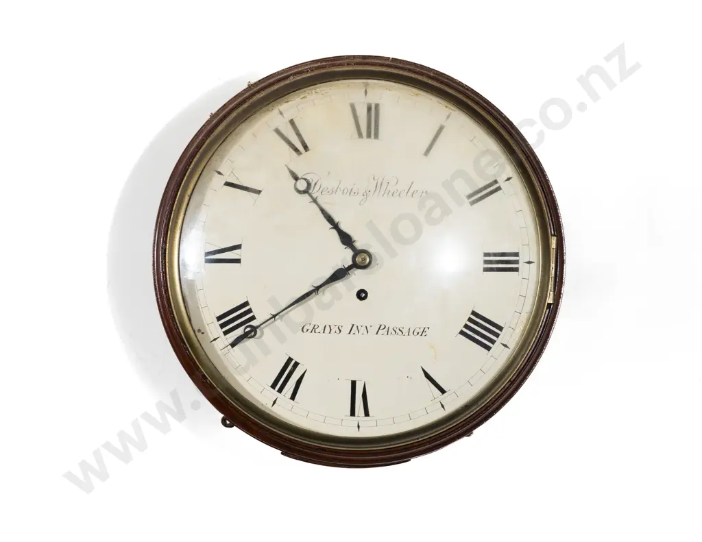 An Attractive Regency Mahogany Circular Wall Clock by Desbois & Wheeler Image 1++