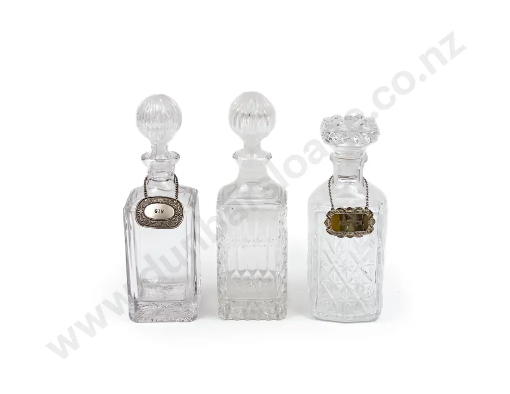 Three Assorted Glass Decanters Image 1++