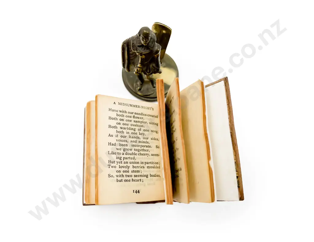 Small Brass Book Stand of Shakespeare together with Miniature Shakespeare Volume Image 1++