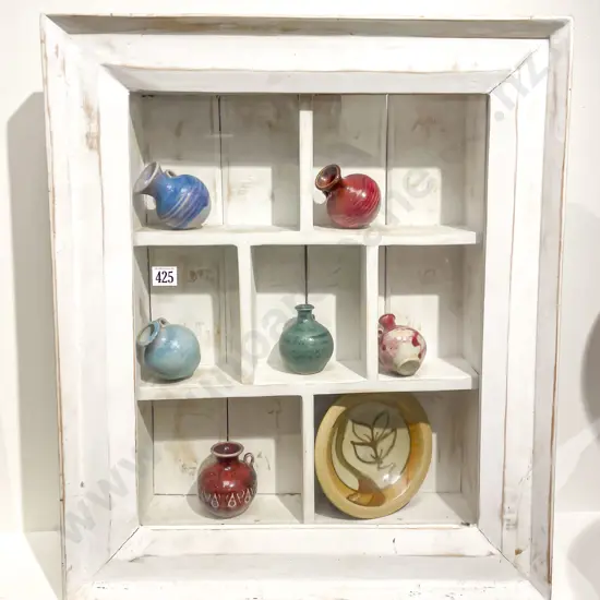 Framed Display of Assorted Pottery