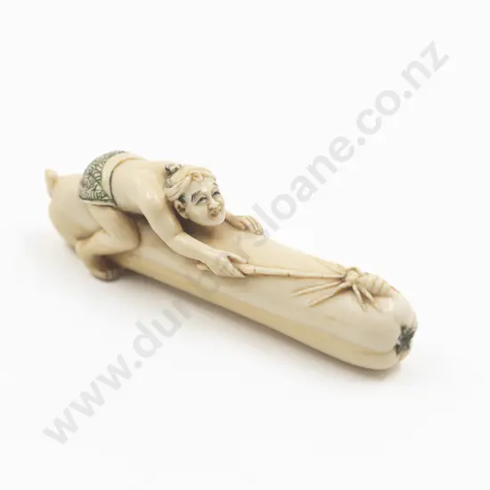 Japanese Ivory Netsuke Of a Man On A Large Squash