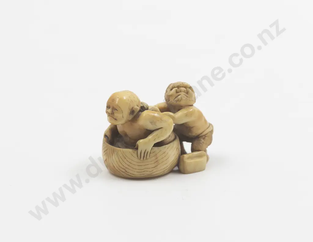 Signed Ivory Netsuke of a Sage in Bath Image 1++