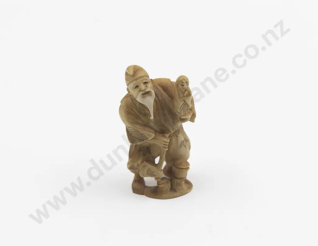 Signed Ivory Okimono of a Doll Maker Image 1++