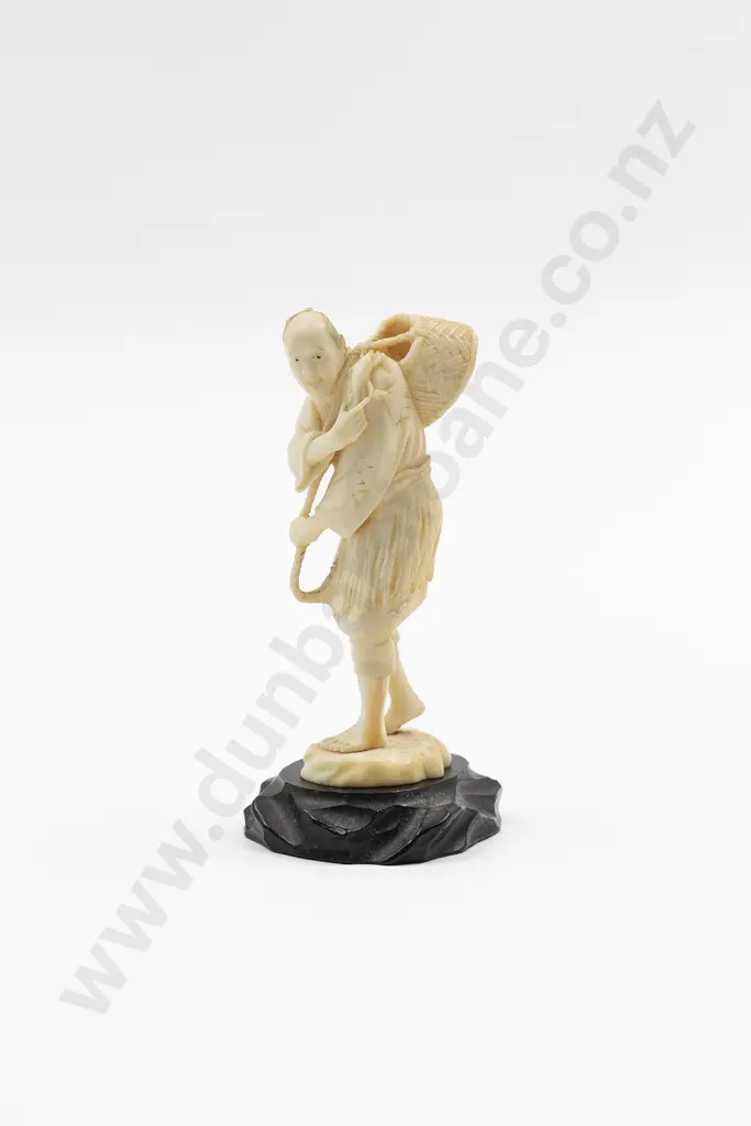 Signed Ivory Figure of Standing Fisherman Image 1++