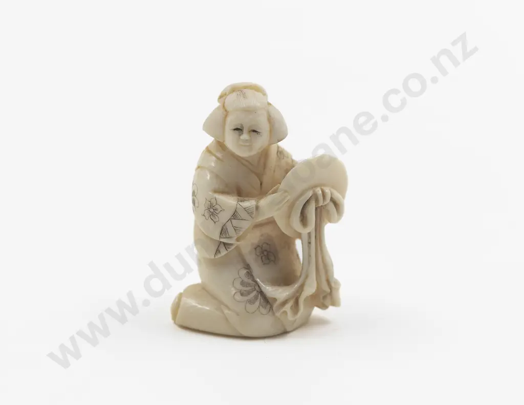 Signed Carved Ivory Netsuke of a Geisha kneeling holding a mirror Image 1++