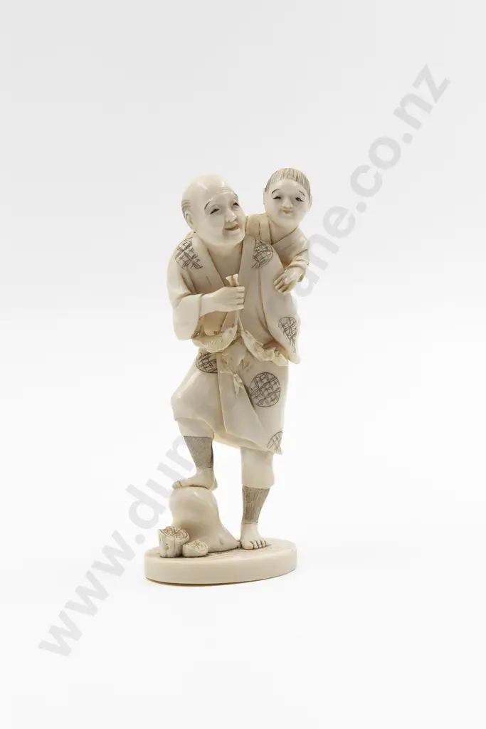 Signed Carved Ivory Figure of a Fisherman Image 1++