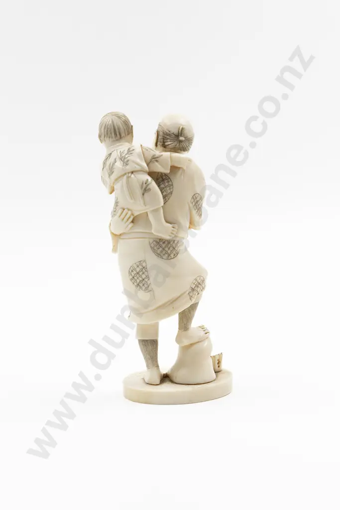 Signed Carved Ivory Figure of a Fisherman Image 1++