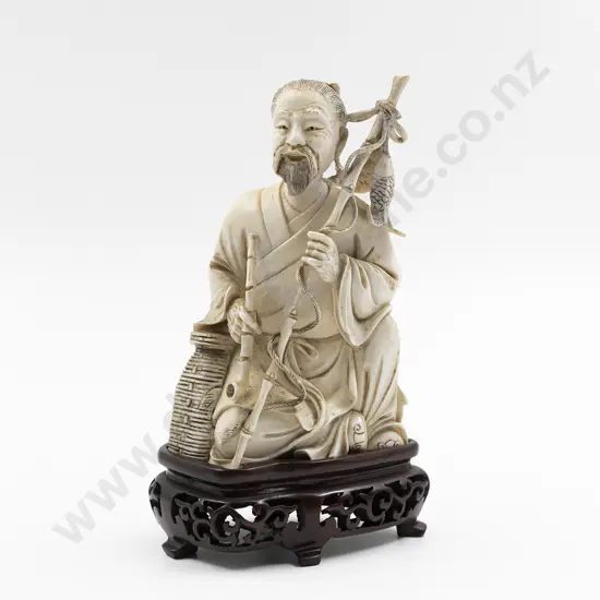 Chinese Carved Ivory Figure of Seated Fisherman