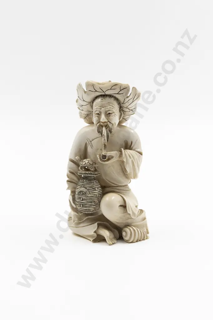 Chinese Carved Ivory Figure of Seated Trader Image 1++