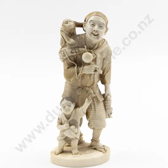 Japanese Signed Carved Ivory Figure of a Monkey Trainer