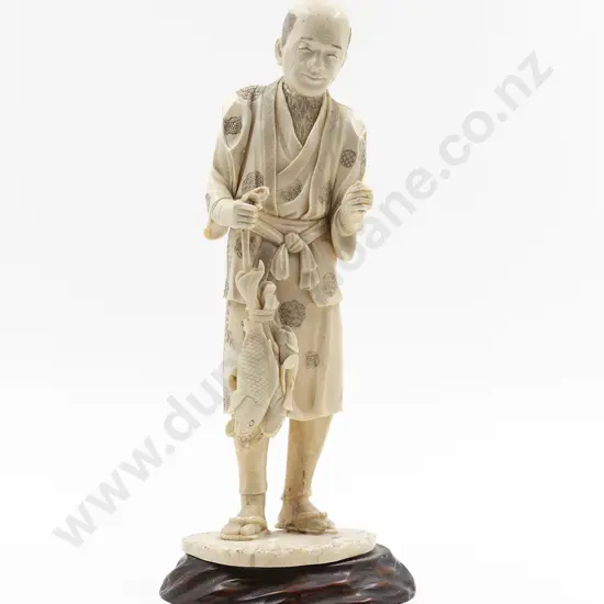 Japanese Signed Carved Ivory Figure of a Standing Fisherman
