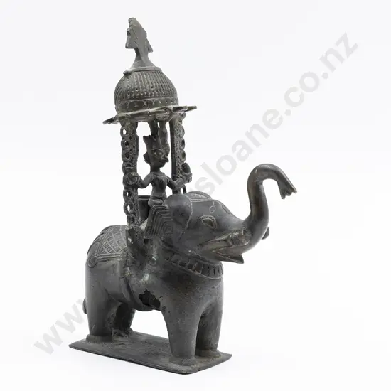 An Indian 19th Century Dhokra Bronze Elephant With A Figure Of The Hindu Warrior Khandoba