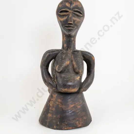 A Decorative African Female Sitting Figure