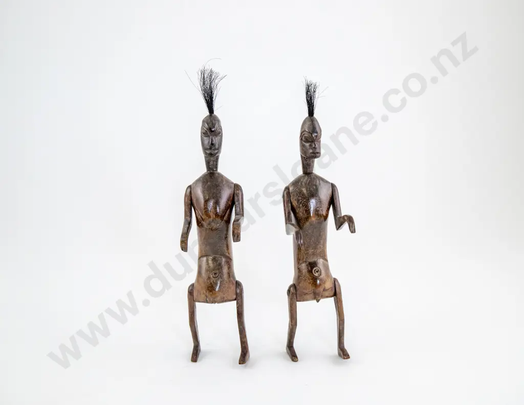 A Pair Of Articulated Male And Female Figures Image 1++