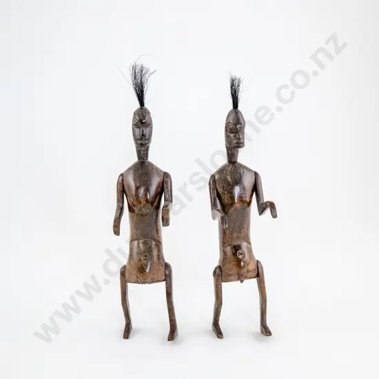 A Pair Of Articulated Male And Female Figures
