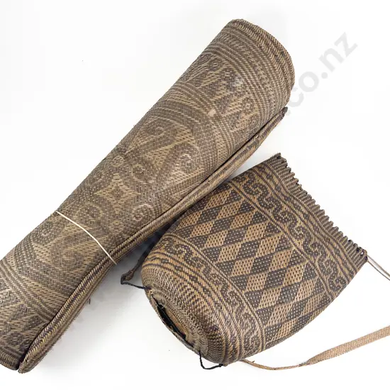 A Woven Sleeping Mat And Food Basket