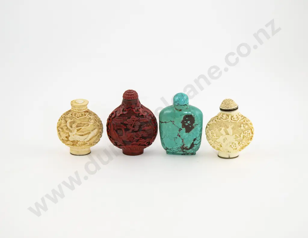 Four Chinese Snuff Bottles Image 1++