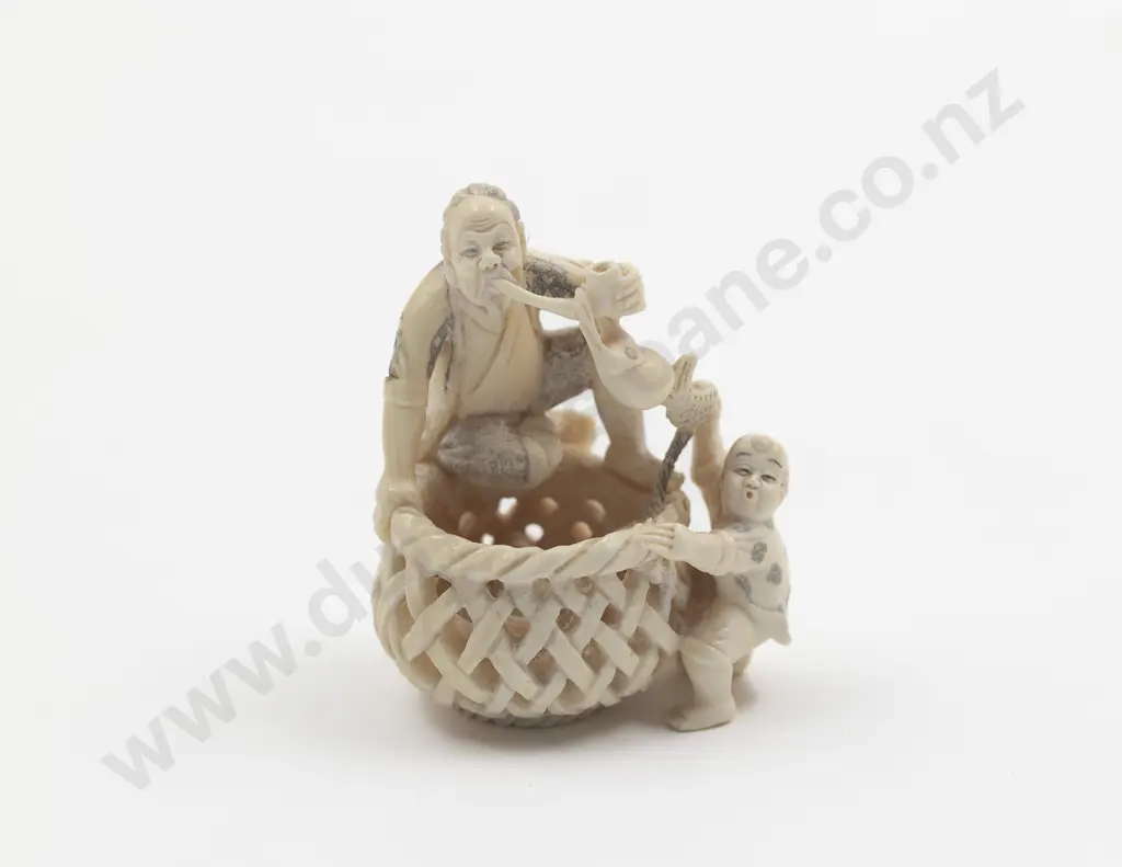 Signed and Coloured Pattern Ivory Netsuke of an Old Fisherman Image 1++