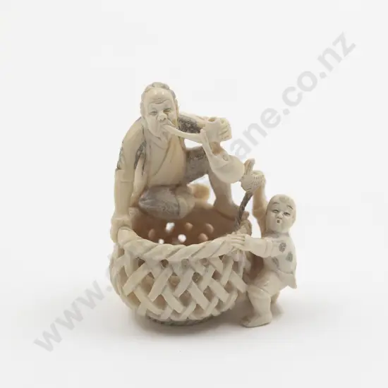 Signed and Coloured Pattern Ivory Netsuke of an Old Fisherman