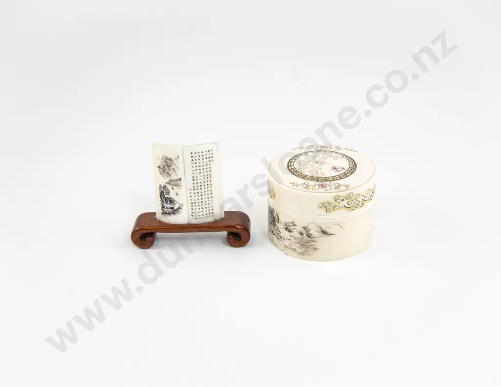 A Small Ivory Lidded Box With An Ivory Scroll Ornament On Wooden Base Image 1++