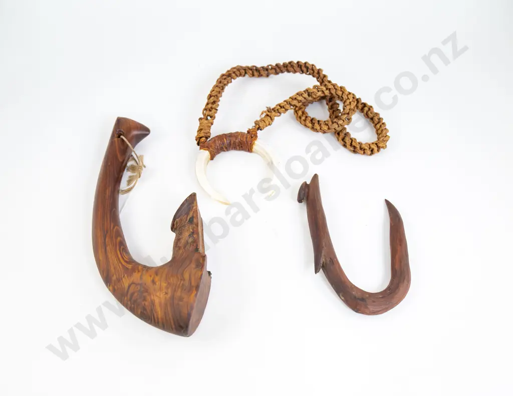 A Carved Wood Adze Handle And Matau With A Boar Tusk Necklace Image 1++