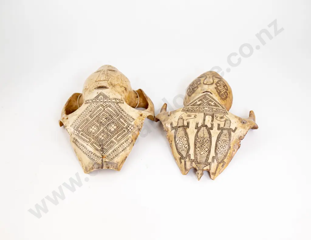 Two Carved Horse Skull Figures Image 1++