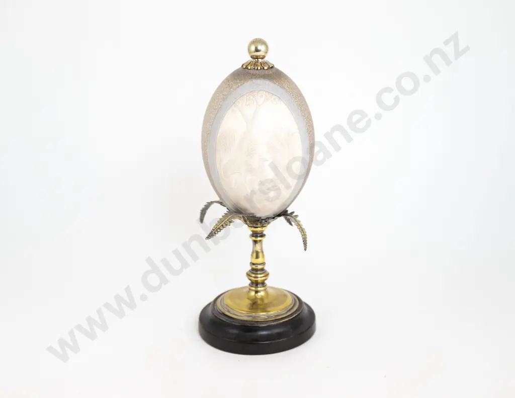 An Australian Carved Emu Egg On A Brass Turned Stand With Black Ebonised Base Image 1++