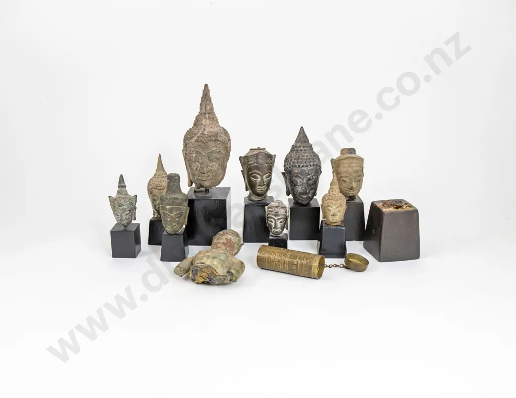 Collection Of Ten Thai And Indian Buddha Heads Mounted On Ebonised Stands Image 1++