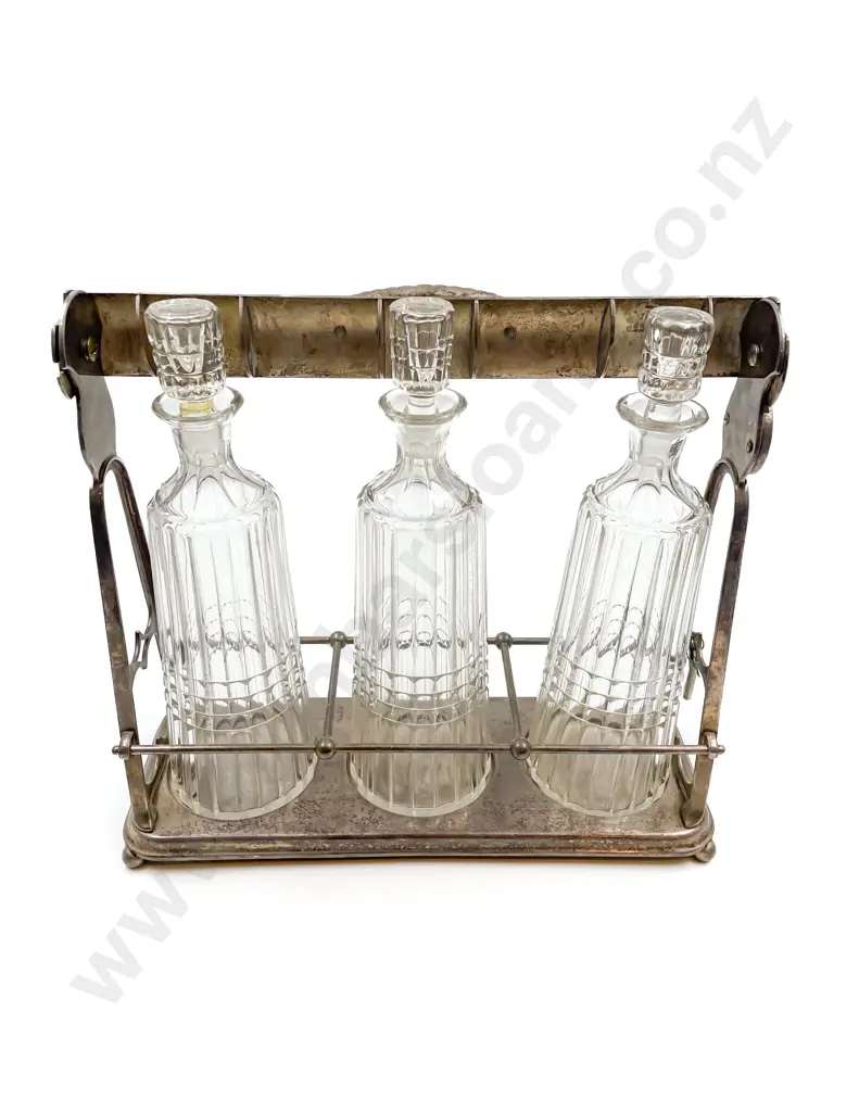 Set of Three Victorian Connical Decanters in Plated Tantalus Image 1++