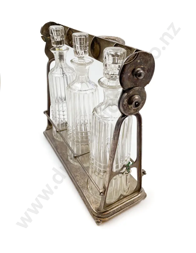 Set of Three Victorian Connical Decanters in Plated Tantalus Image 1++