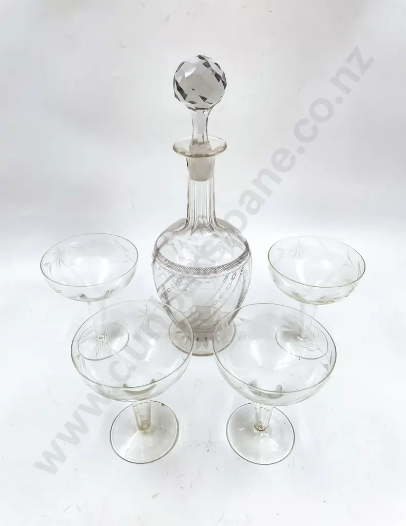 Etched Glass Decanter together with Four Hollow Stem Champagne Glasses Image 1++