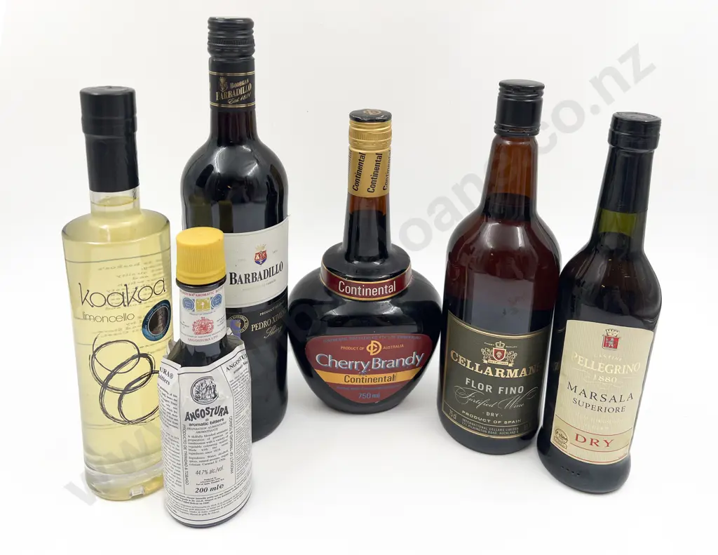 Six Bottles of Assorted Alcohol Image 1++