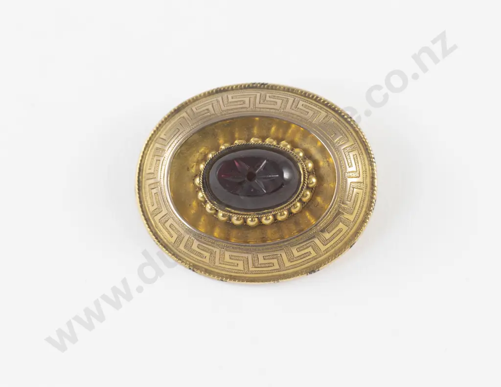 Victorian 9ct Single Garnet Oval Target Brooch Image 1++