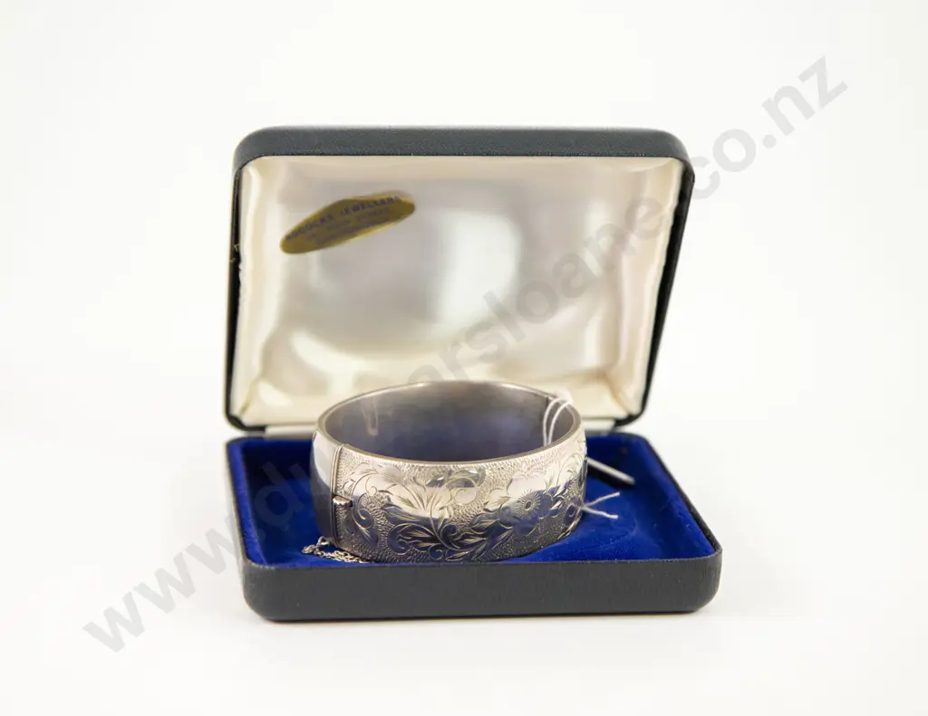 S/S Half Engraved Hinged Snap Bangle Image 1++