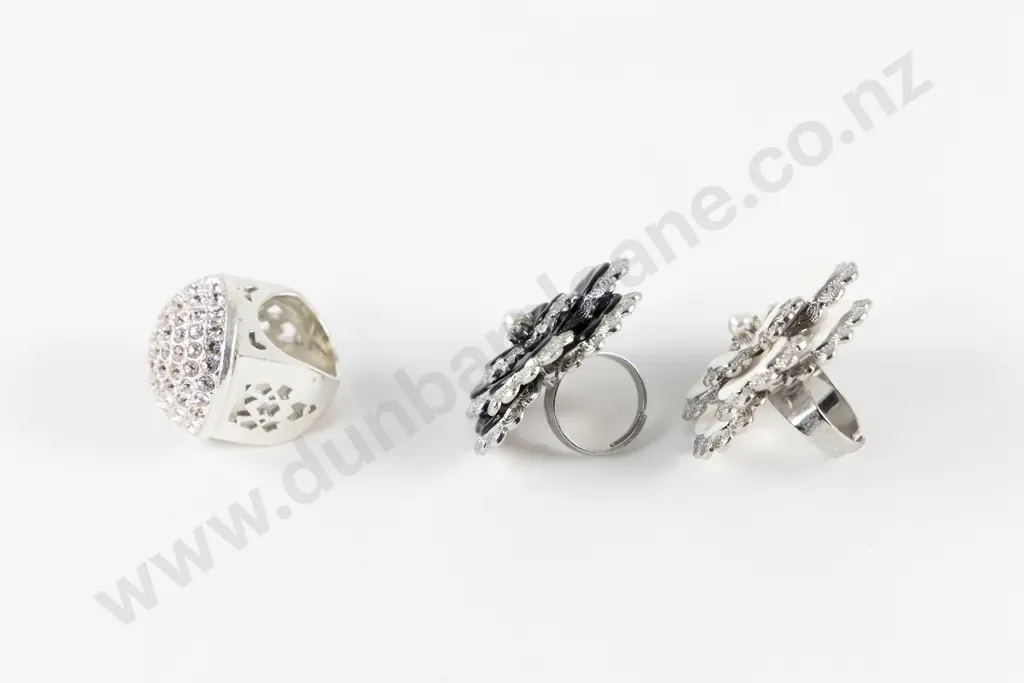 Two Mimco Camellia Flower Dress Rings and Diamanté Dress Ring Image 1++