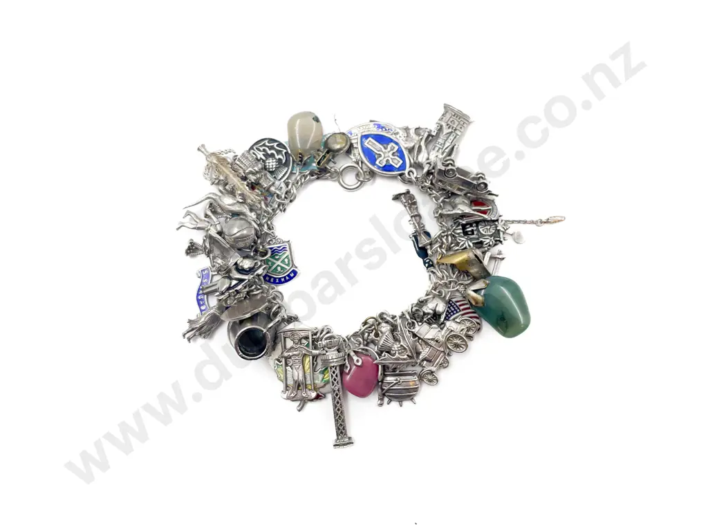 Charm Bracelet with Assorted Mostly Silver Charms Image 1++