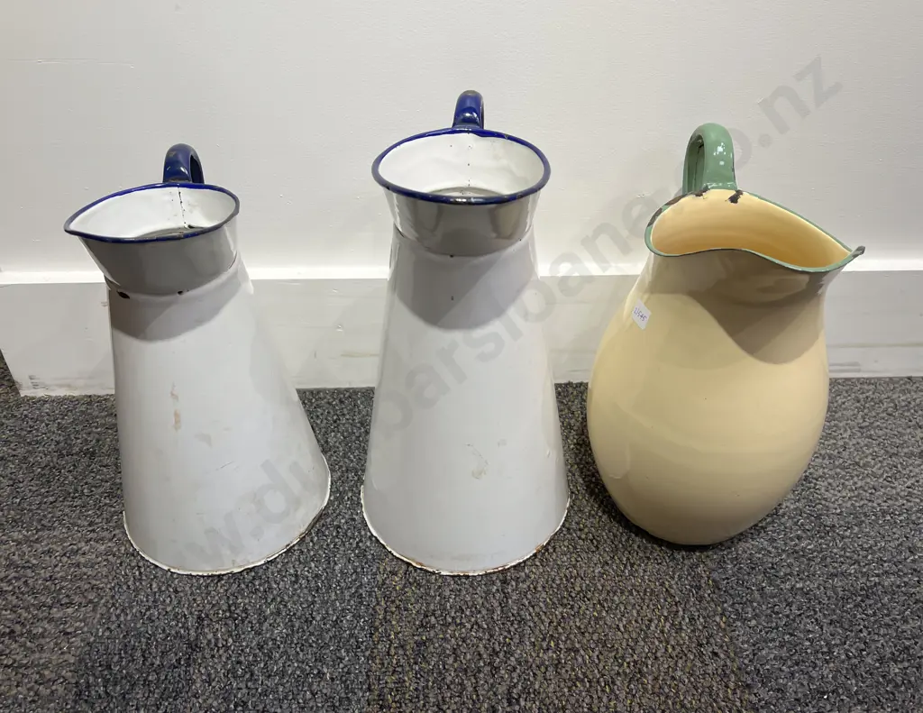 Three Assorted Enamel Jugs Image 1++
